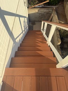 Custom outdoor deck with railing and framing (project 7)